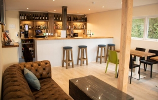 Dovecote seating area facing towards bar at Whitsand Bay Golf Club